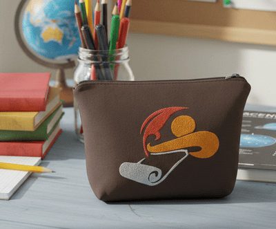 trousse brodée  L'envol école "la plume d'or"