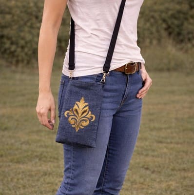 pochette téléphone arabesque roseé et pailleté